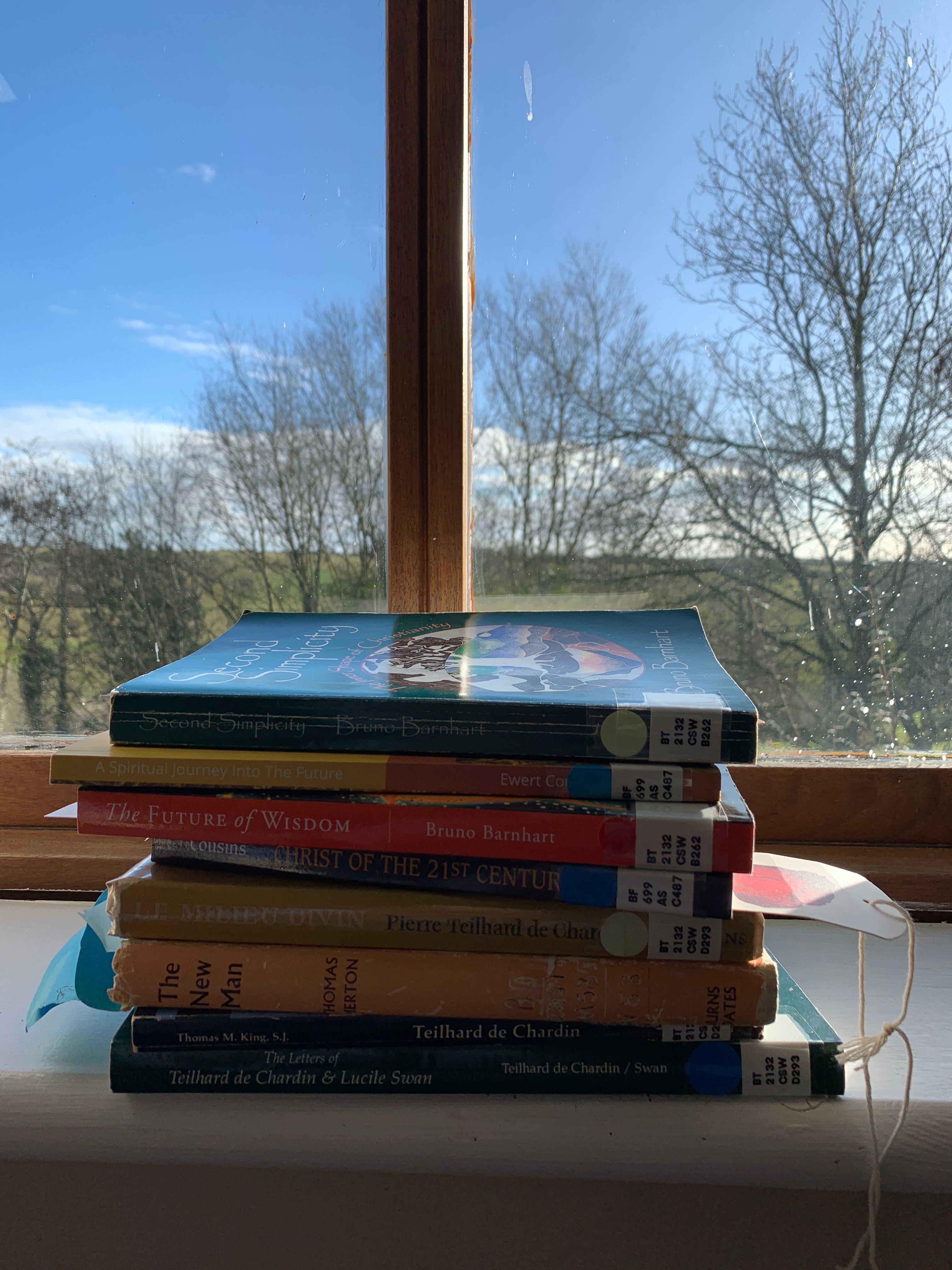 Stack of personal development books, coaching 